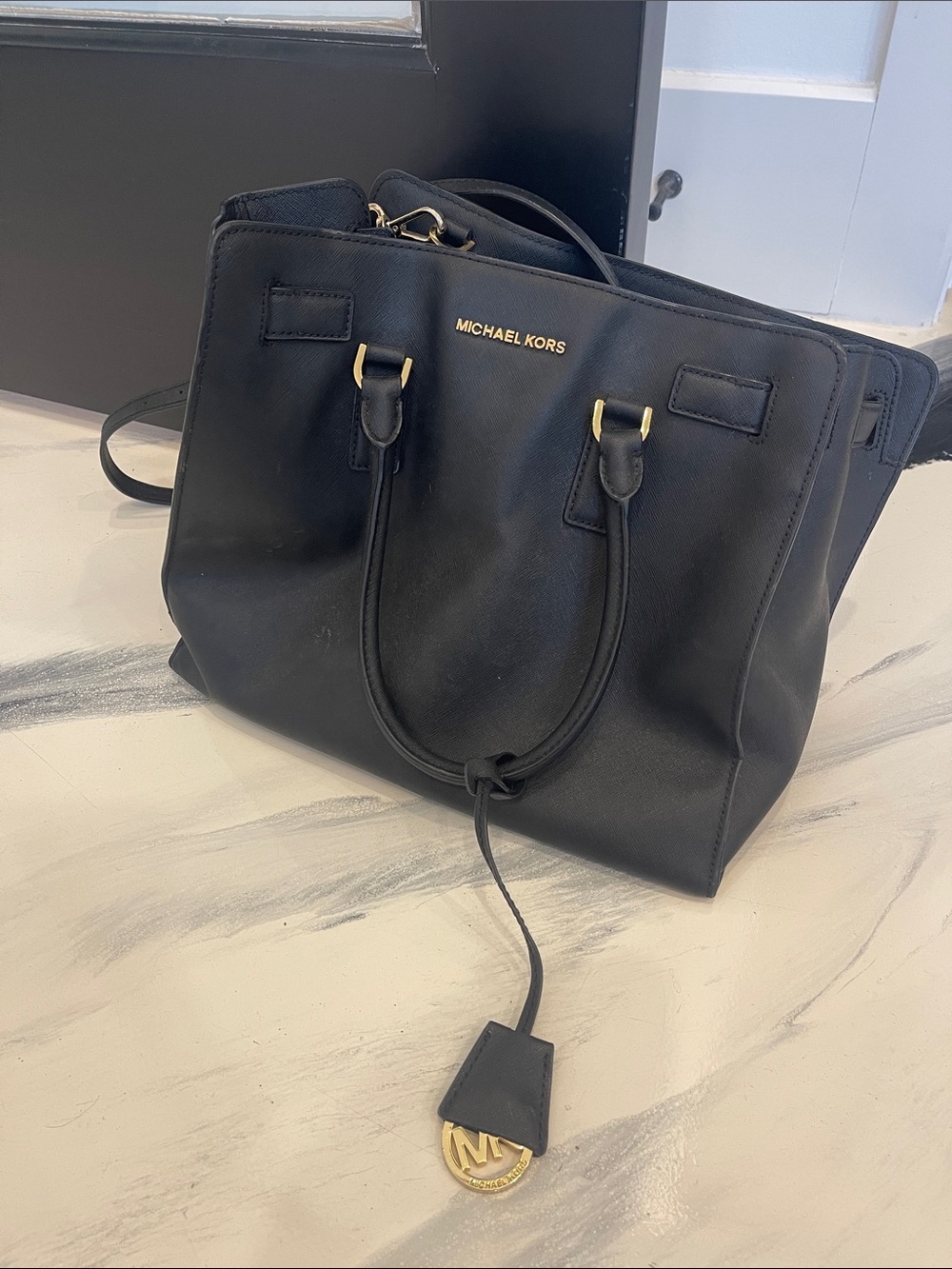 Michael Kors Black Leather Satchel with Gold Accents